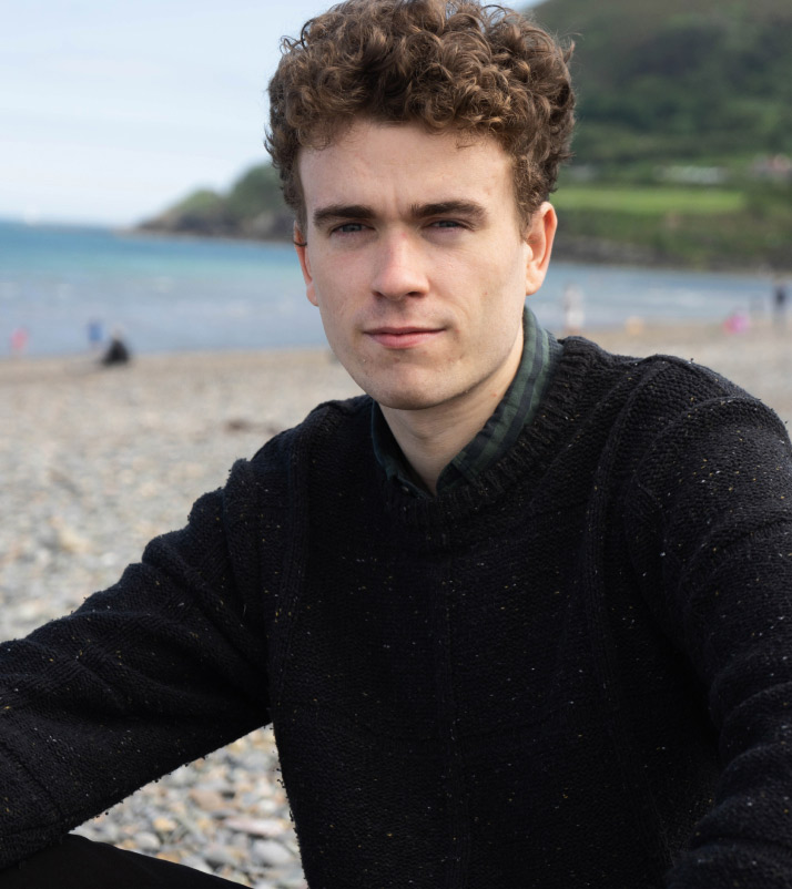 Portrait of Tom Gillan on the beach